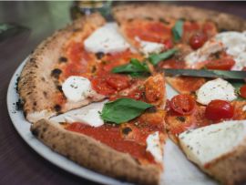 Simple italian pizza with cherry tomatoes